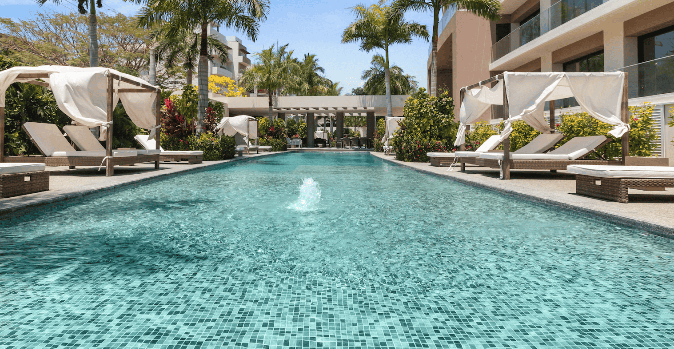 2 SWIMMING POOLS WITH SUN DECKS