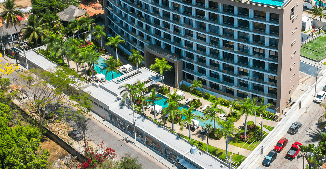 EXPANSIVE GREEN AREAS AND LANDSCAPED GARDENS